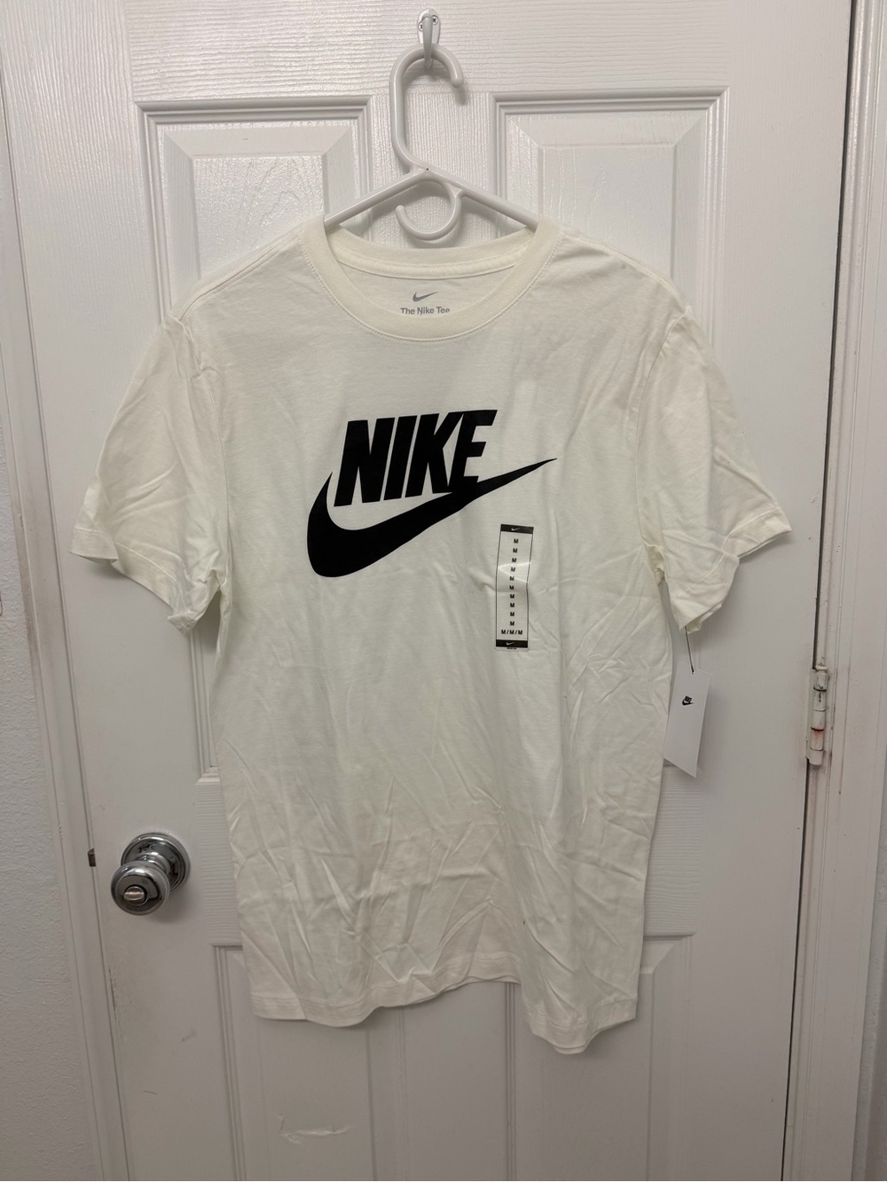 Nike White Short Sleeve T-Shirt with Black Swoosh Logo
